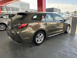 Bronze (pintura metalizada) Usado 2021 Toyota Corolla Comfort | € 23.900 (Preço justo)