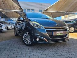 Cinza Usado 2017 Peugeot 208 Style Citadino | € 8.900 (Preço justo)