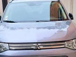 Cinzento Usado 2014 Mitsubishi Outlander P-HEV SUV | € 14.900 (Preço justo)