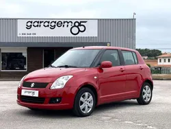 Vermelho (metalizado) Usado 2009 Suzuki Swift Comfort Citadino | € 7.500