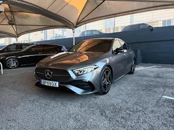 Cinza Usado 2024 Mercedes A180 AMG line Sedan | € 38.250 (Preço elevado)