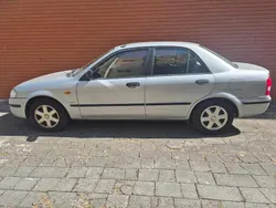 Cinzento Usado 1999 Mazda 323 Sedan | € 1.199
