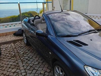Usado Peugeot 206 109 HP (80 kW) 2006 Cinzento Cabrios