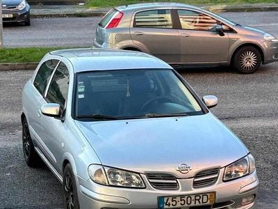 Usado Nissan Almera 110 HP (80 kW) 2001 Cinzento Citadino