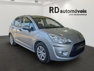Usado Citroën C3 Attraction 70 HP (51 kW) 2010 Cinzento Citadino