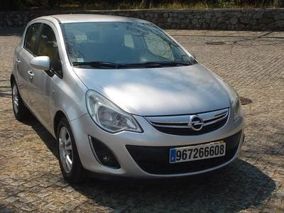 Usado Opel Corsa 85 HP (62 kW) 2011 Cinzento Citadino