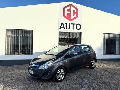 Usado Opel Corsa 85 HP (62 kW) 2011 Cinzento Citadino