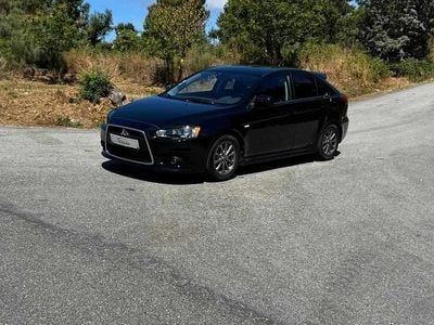 Preto Usado 2013 Mitsubishi Lancer Citadino | € 7.900