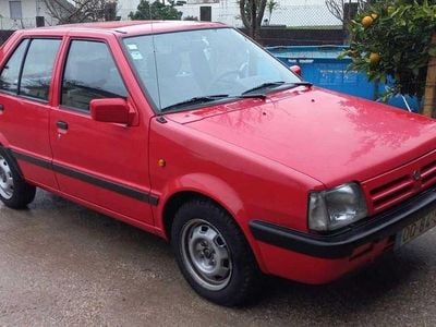 Vermelho Usado 1991 Nissan Micra Sedan | € 1.900
