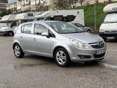 Usado Opel Corsa Enjoy 85 HP (62 kW) 2010 Cinza Citadino