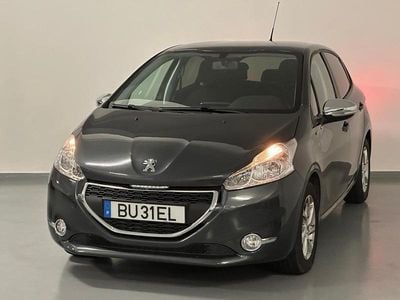 Usado Peugeot 208 82 HP (60 kW) 2014 Cinzento Citadino