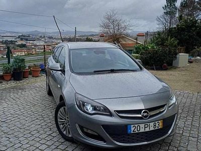 Usado Opel Astra 110 HP (80 kW) 2014 Cinzento Carrinha