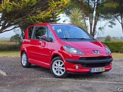 Usado Peugeot 1007 68 HP (50 kW) 2005 Vermelho Monovolume