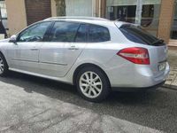 Usado Renault Laguna III Dynamique 110 HP (80 kW) 2008 Cinzento Carrinha