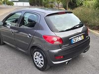 Usado Peugeot 206 68 HP (50 kW) 2010 Cinzento Citadino