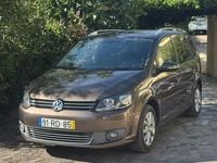 Usado VW Touran 105 HP (77 kW) 2013 Castanho Monovolume