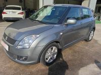 Usado Suzuki Swift 75 HP (55 kW) 2010 Cinzento Citadino
