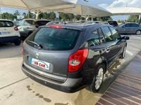 Usado Renault Laguna III Dynamique 150 HP (110 kW) 2007 Cinzento Carrinha