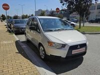 Usado Mitsubishi Colt 75 HP (55 kW) 2009 Cinzento Citadino