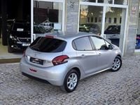 Usado Peugeot 208 Style 100 HP (73 kW) 2015 Cinzento Citadino