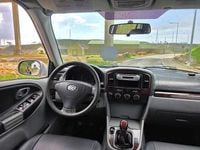 Usado Suzuki Grand Vitara 109 HP (80 kW) 2005 Cinzento Citadino