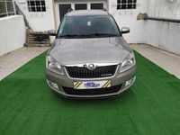 Usado Skoda Roomster 75 HP (55 kW) 2013 Cinzento Monovolume