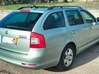 Usado Skoda Octavia GreenLine 105 HP (77 kW) 2010 Cinzento Carrinha