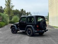 Usado Jeep Wrangler Sport 121 HP (88 kW) 1998 Preto SUV