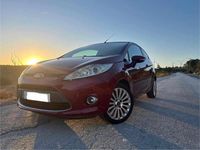 Usado Ford Fiesta 82 HP (60 kW) 2009 Vermelho Citadino