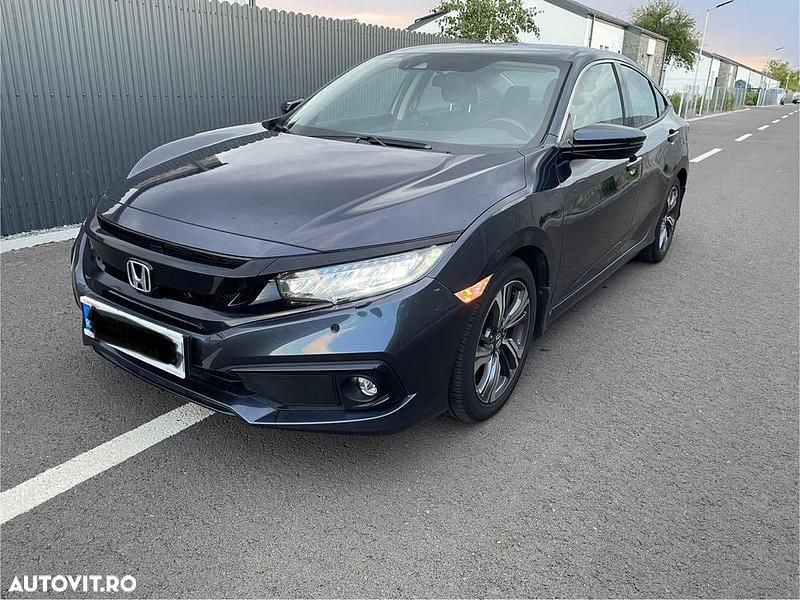 Culoarealbastru Utilizat 2020 Honda Civic Elegance Berlinǎ | 20.000 EUR (Puțin scump) - Imagine 1/4