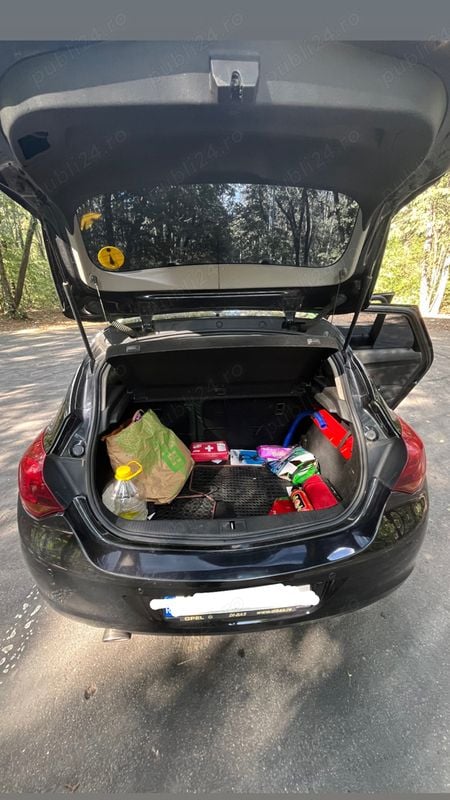 Second-hand Opel Astra Edition 180 CP (132 kW) 2010 Negru Berlinǎ