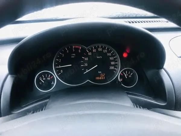 Violet Second-hand 2006 Opel Corsa Hatchback | 1.250 EUR (Preț bun) - Imagine 1/4