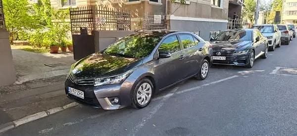 Gri Utilizat 2014 Toyota Corolla Berlinǎ | 9.500 EUR (Preț bun) - Imagine 1/4