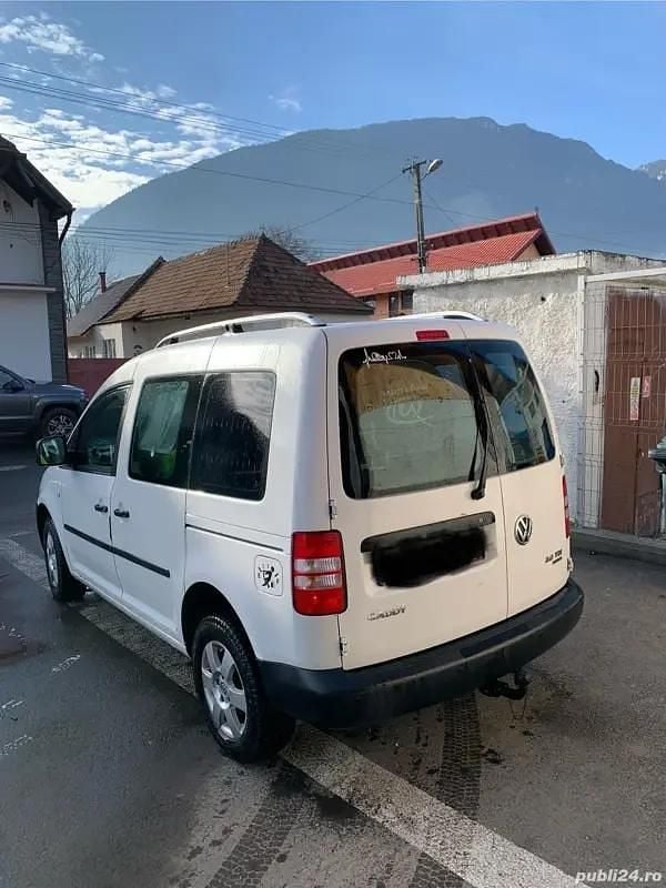 Second-hand VW Caddy 81 CP (59 kW) 2012 Alb Monovolum