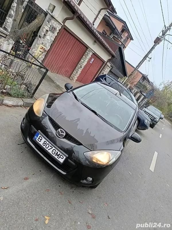 Negru Second-hand 2010 Mazda 2 Hatchback | 2.550 EUR (Super Preț) - Imagine 1/4
