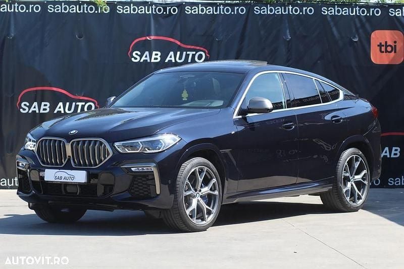 Culoarenegru Utilizat 2020 BMW X6 M SUV | 63.033 EUR (Preț bun) - Imagine 1/4