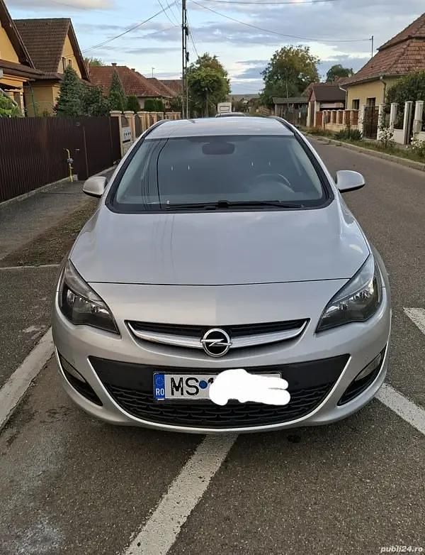 Gri Utilizat 2016 Opel Astra Break | 5.300 EUR (Preț bun) - Imagine 1/4