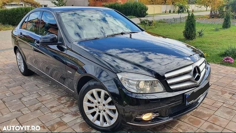 Culoarenegru Utilizat 2009 Mercedes C220 Berlinǎ | 6.499 EUR (Preț OK) - Imagine 1/4
