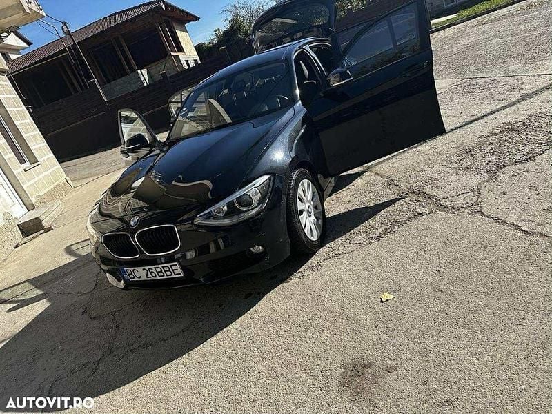 Culoarenegru Second-hand 2013 BMW 116 Hatchback | 5.500 EUR (Preț OK) - Imagine 1/4