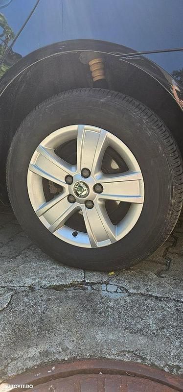 Culoarenegru Utilizat 2009 Skoda Octavia GreenLine Break | 4.300 EUR (Preț OK) - Imagine 1/4
