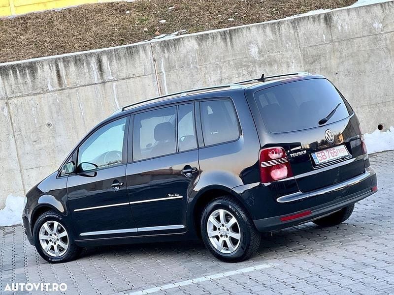 Second-hand VW Touran Highline 140 CP (102 kW) 2009 Culoarenegru Monovolum