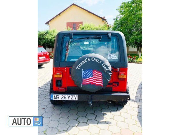 Second-hand Jeep Wrangler 130 CP (95 kW) 1993 Rosu SUV