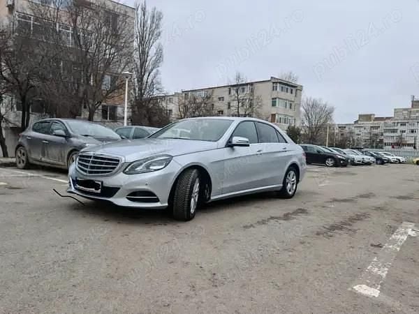 Second-hand Mercedes E200 136 CP (100 kW) 2013 Argintiu Berlinǎ