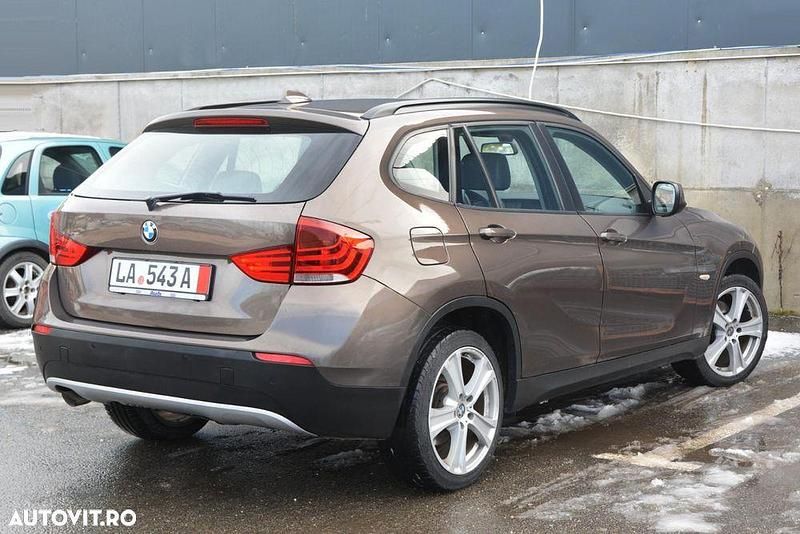 Second-hand BMW X1 Sport Line 143 CP (105 kW) 2011 Culoaremaro SUV