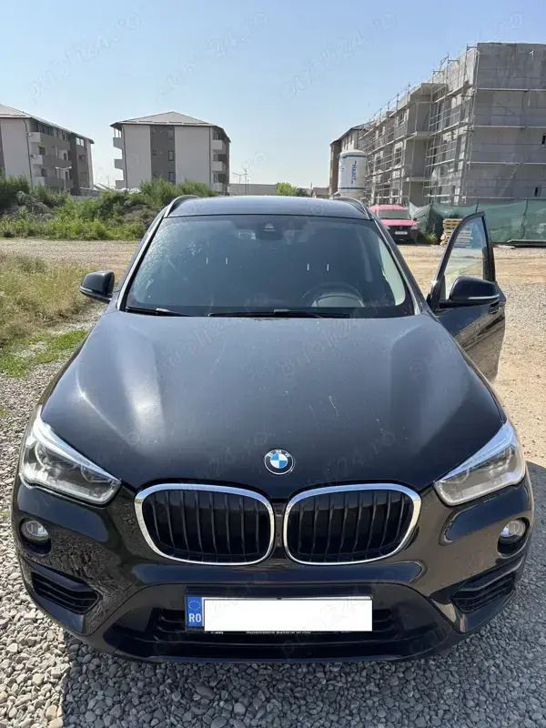 Negru Utilizat 2018 BMW X1 Sport Line SUV | 25.000 EUR - Imagine 1/4