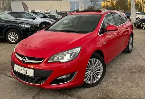 Rosu Utilizat 2016 Opel Astra Exklusiv Break | 6.390 EUR (Preț OK) - Imagine 1/4