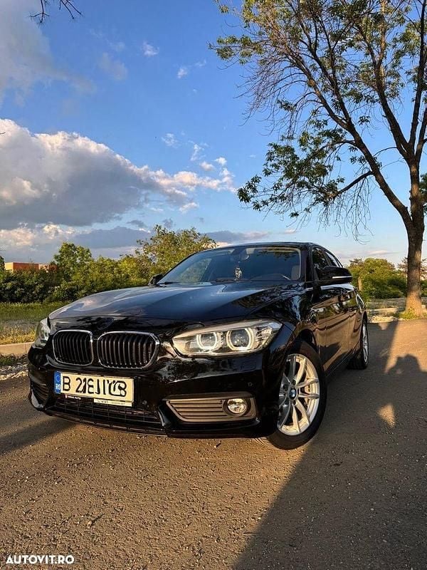 Culoarenegru Utilizat 2018 BMW 118 Hatchback | 10.799 EUR (Super Preț) - Imagine 1/4