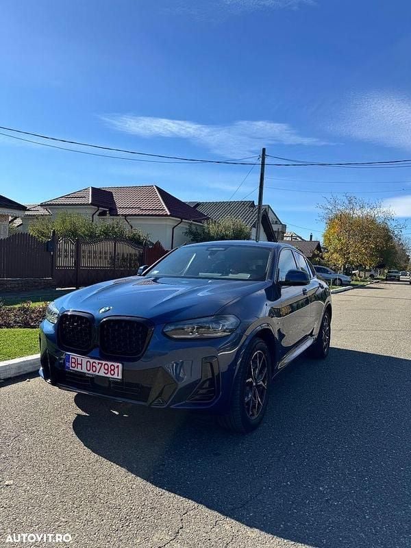 Culoarealbastru Second-hand 2024 BMW X4 SUV | 50.500 EUR (Preț bun) - Imagine 1/4