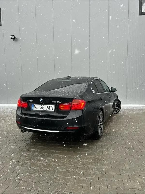 Second-hand BMW 320 184 CP (135 kW) 2012 Negru Berlinǎ