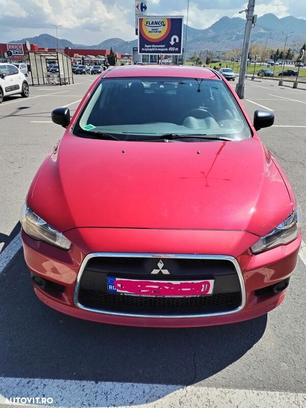 Rosu Utilizat 2015 Mitsubishi Lancer Hatchback | 5.650 EUR - Imagine 1/4